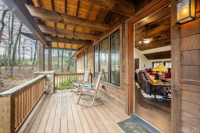 wooden terrace with a porch