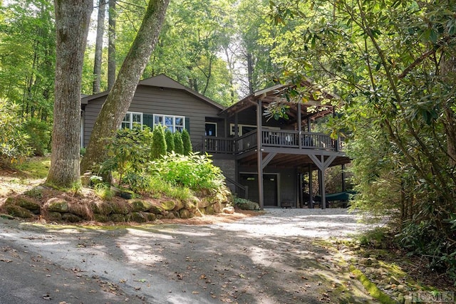 view of front of property featuring a wooden deck