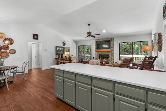 86 Beech Ct, Sapphire, NC 28774 - kitchen featuring a fireplace, a ceiling fan, open floor plan, light countertops, and vaulted ceiling