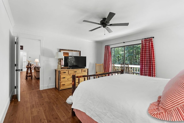 86 Beech Ct, Sapphire, NC 28774 - bedroom with dark wood finished floors, a ceiling fan, and ornamental molding
