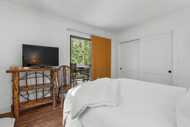 86 Beech Ct, Sapphire, NC 28774 - bedroom featuring wood finished floors, access to outside, and a closet