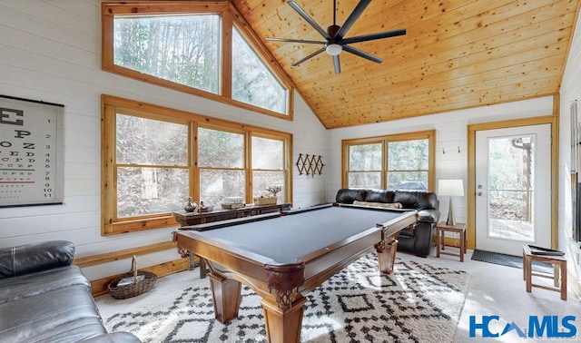 recreation room featuring high vaulted ceiling, wooden walls, pool table, carpet flooring, and wood ceiling