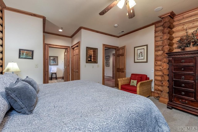 carpeted bedroom featuring rustic walls, crown molding, and ceiling fan