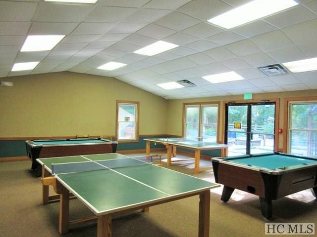 playroom with light colored carpet, pool table, and a paneled ceiling