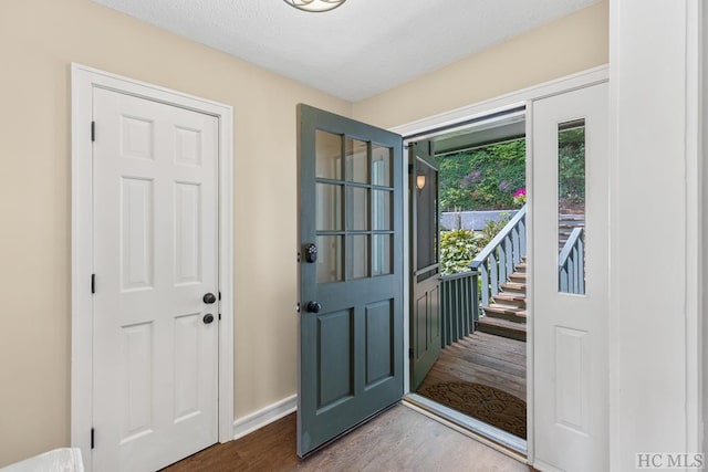 foyer featuring hardwood / wood-style floors