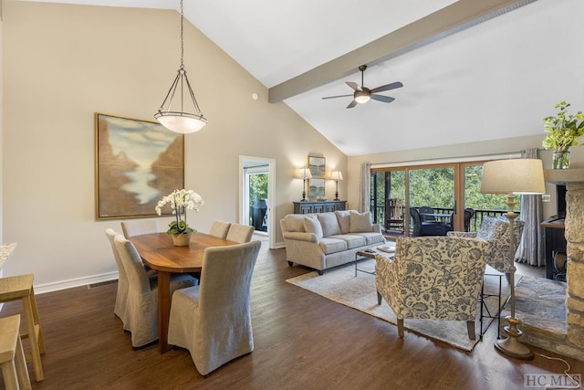 dining space with dark wood-type flooring, ceiling fan, and high vaulted ceiling