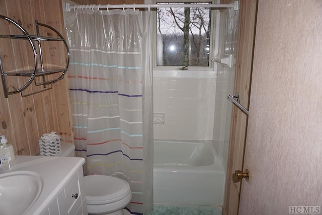 full bathroom with shower / bathtub combination with curtain, vanity, and toilet