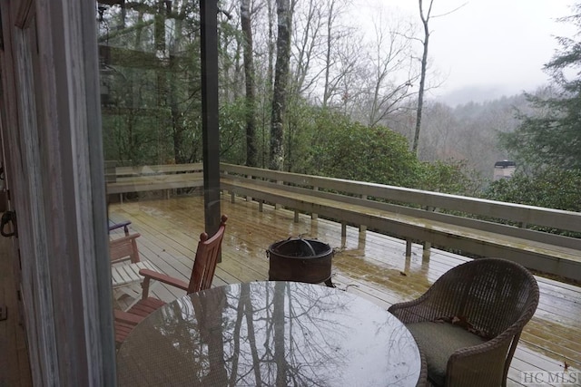 deck featuring a fire pit