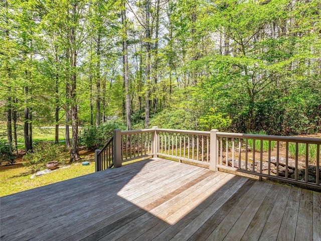 wooden terrace with a forest view