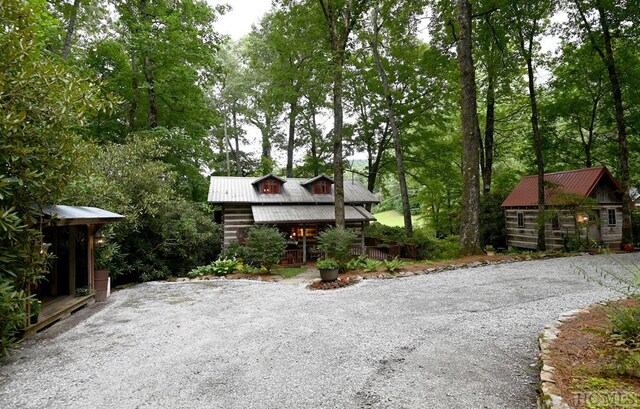 view of log cabin