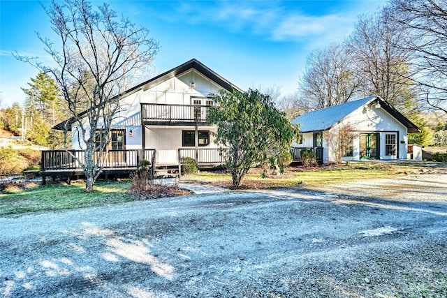 view of front of home with a wooden deck