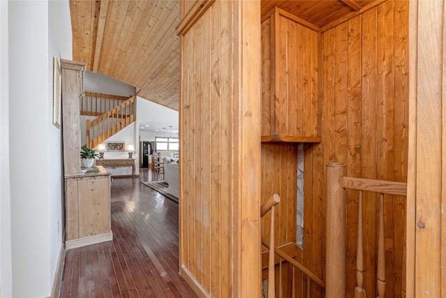 hallway featuring wood ceiling and wood-type flooring