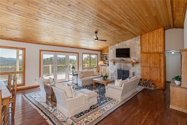 living room featuring wooden ceiling, wood finished floors, a ceiling fan, and vaulted ceiling