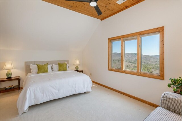 bedroom with a ceiling fan, baseboards, visible vents, and light carpet