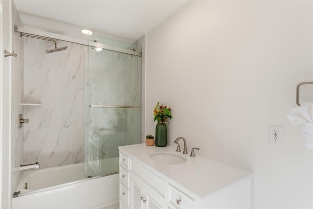 full bathroom with vanity and bath / shower combo with glass door