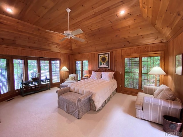 bedroom with wood ceiling, ceiling fan, carpet floors, and multiple windows