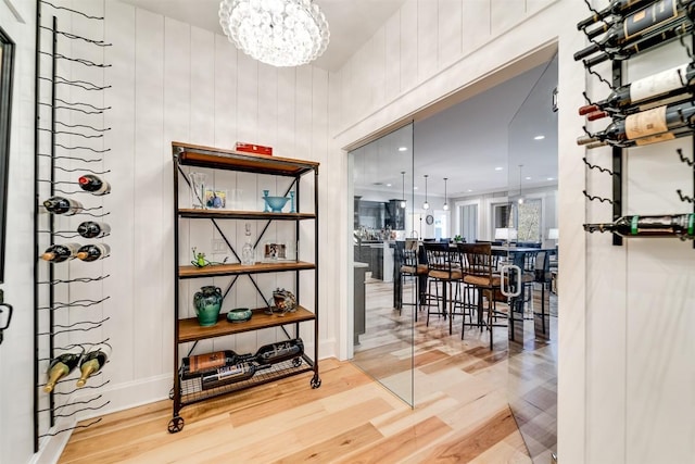 1132 Southshore Dr, Tuckasegee, NC 28783 - wine cellar featuring a notable chandelier and wood finished floors