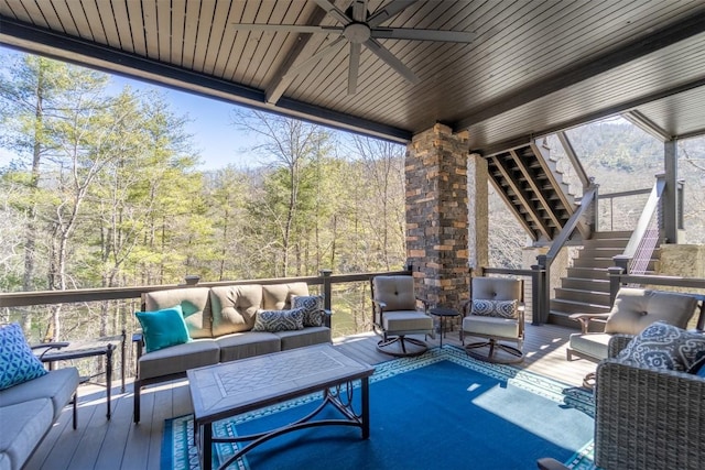1132 Southshore Dr, Tuckasegee, NC 28783 - exterior space featuring stairway, a wooden deck, an outdoor hangout area, ceiling fan, and a forest view