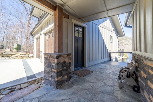 1132 Southshore Dr, Tuckasegee, NC 28783 - property entrance with a garage and board and batten siding