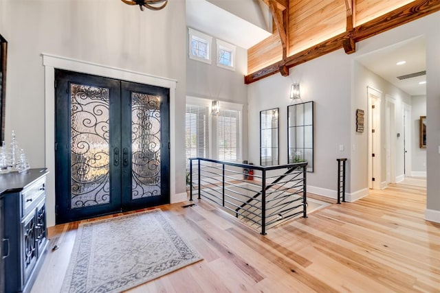 1132 Southshore Dr, Tuckasegee, NC 28783 - entryway featuring baseboards, visible vents, wood finished floors, and french doors