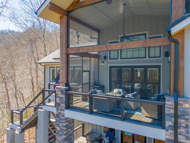 1132 Southshore Dr, Tuckasegee, NC 28783 - rear view of property featuring board and batten siding and stairs