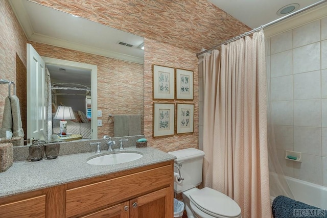 full bathroom with toilet, vanity, crown molding, and shower / tub combo with curtain