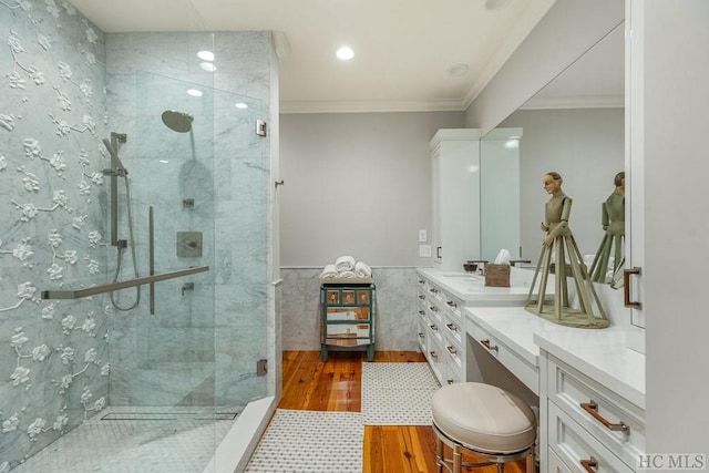 bathroom with vanity, walk in shower, crown molding, and tile patterned flooring