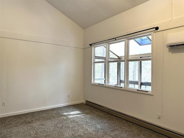 empty room featuring baseboards, carpet, vaulted ceiling, baseboard heating, and a textured ceiling