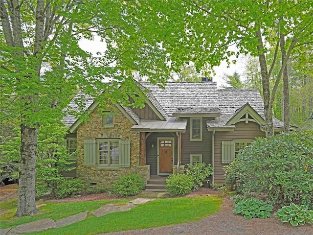 view of front facade featuring stone siding