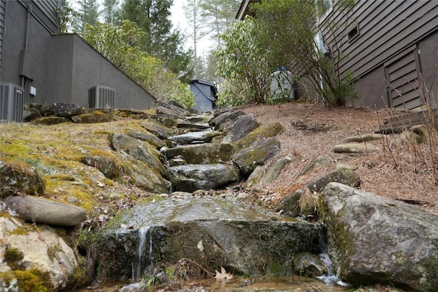 view of yard featuring central AC