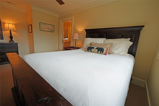 carpeted bedroom featuring ornamental molding and ceiling fan