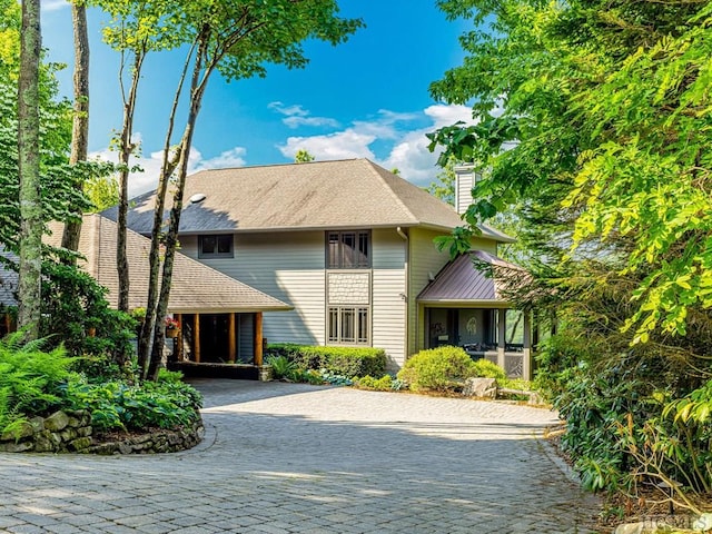 front of property with a sunroom