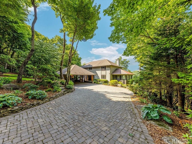 view of front of home featuring a carport