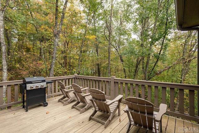 wooden deck with grilling area