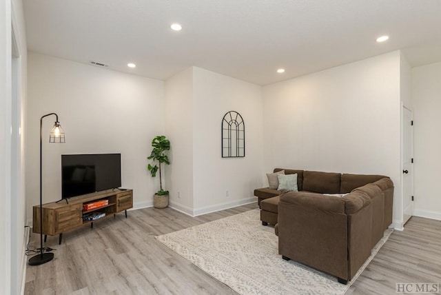 living room with light wood-type flooring