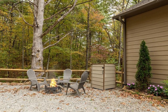 view of patio with a fire pit