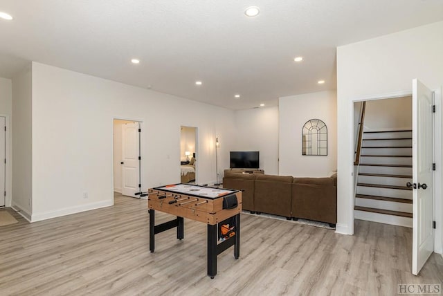 rec room featuring light hardwood / wood-style flooring