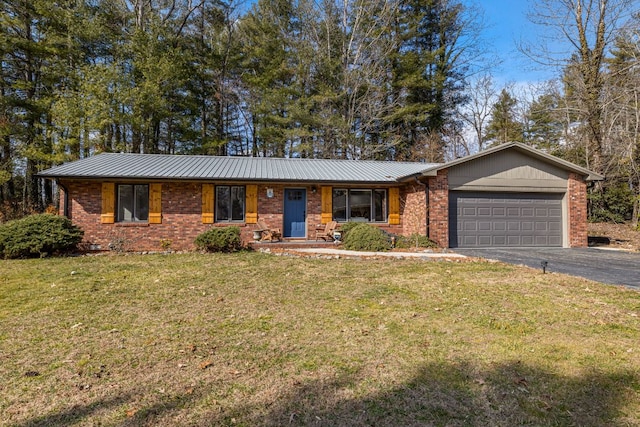 ranch-style house with a front lawn and a garage