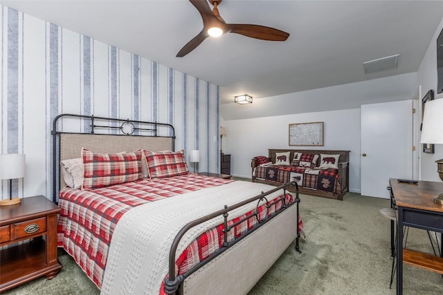 bedroom with carpet, visible vents, ceiling fan, and baseboards