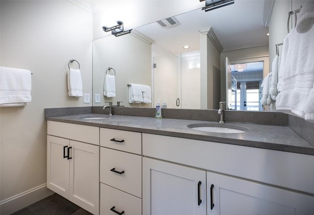 212 Ivorybill Way, Cashiers, NC 28717 - full bath with crown molding, double vanity, a sink, and a stall shower