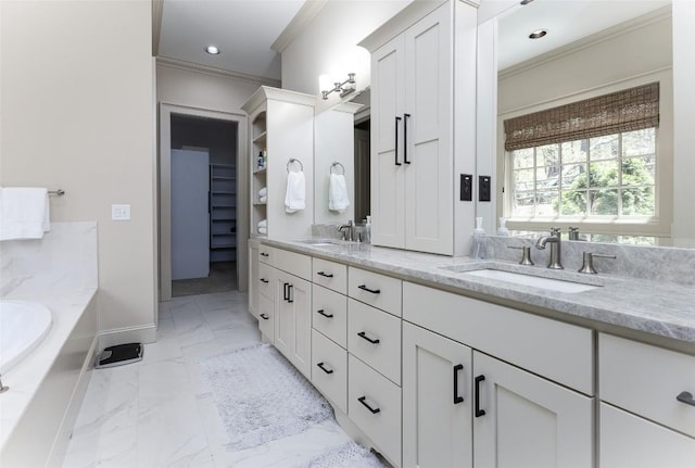 212 Ivorybill Way, Cashiers, NC 28717 - bathroom with a sink, double vanity, marble finish floor, ornamental molding, and a garden tub