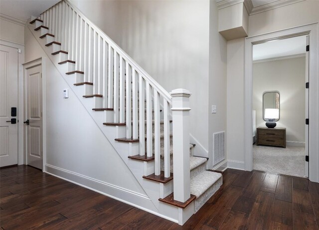 212 Ivorybill Way, Cashiers, NC 28717 - stairs featuring baseboards, ornamental molding, wood-type flooring, and visible vents