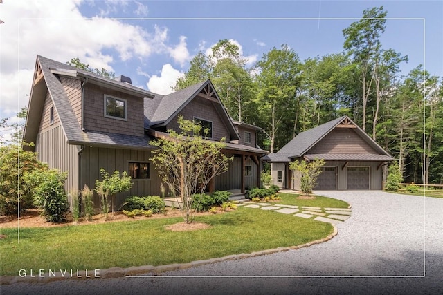 237 Glassy Rock Ln, Glenville, NC 28736 - craftsman house with a garage, board and batten siding, a front lawn, roof with shingles, and driveway