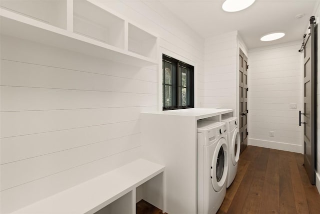 237 Glassy Rock Ln, Glenville, NC 28736 - laundry area featuring washing machine and dryer, a barn door, and dark wood finished floors