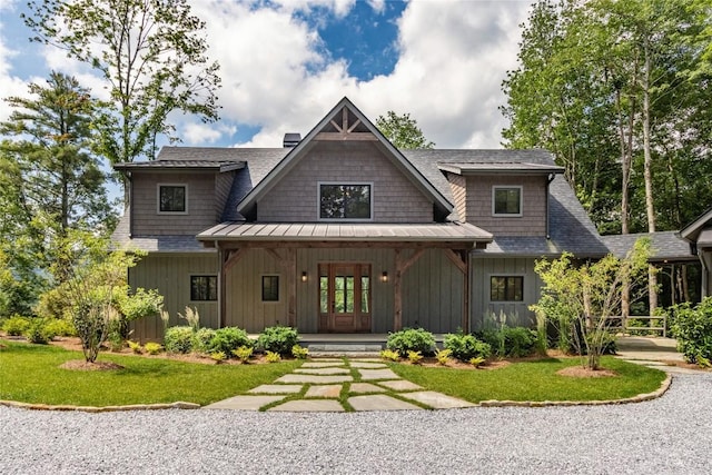 237 Glassy Rock Ln, Glenville, NC 28736 - view of front of house with covered porch, board and batten siding, and a front lawn