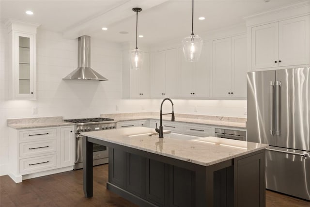 237 Glassy Rock Ln, Glenville, NC 28736 - kitchen with high end appliances, wall chimney exhaust hood, white cabinetry, dark wood-style floors, and light stone counters
