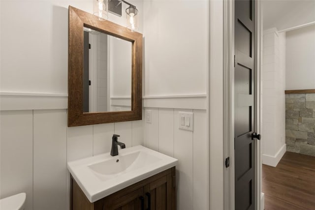 237 Glassy Rock Ln, Glenville, NC 28736 - bathroom featuring vanity, wood finished floors, and tile walls