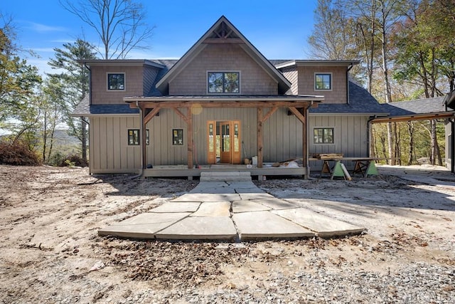 back of house with a porch