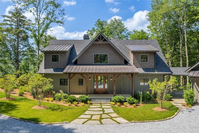 237 Glassy Rock Ln, Glenville, NC 28736 - view of front of house with covered porch, a front yard, roof with shingles, board and batten siding, and a chimney