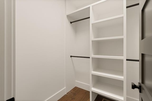 237 Glassy Rock Ln, Glenville, NC 28736 - walk in closet with dark wood-type flooring